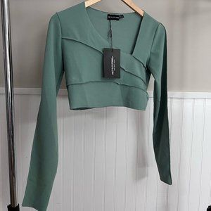 PrettyLittleThing, Size 8, turquoise long sleeve crop top.